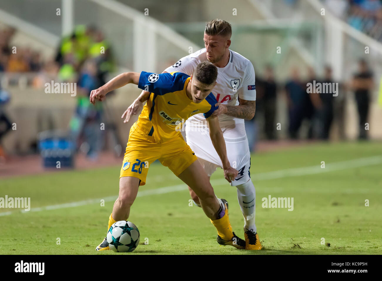 Nicosia, Cyprus - Semptember 26, 2017: Player of Tottenham Toby Alderweireld (R) and of APOEL Roland Sallai (L) in action during the UEFA Champions Le Stock Photo