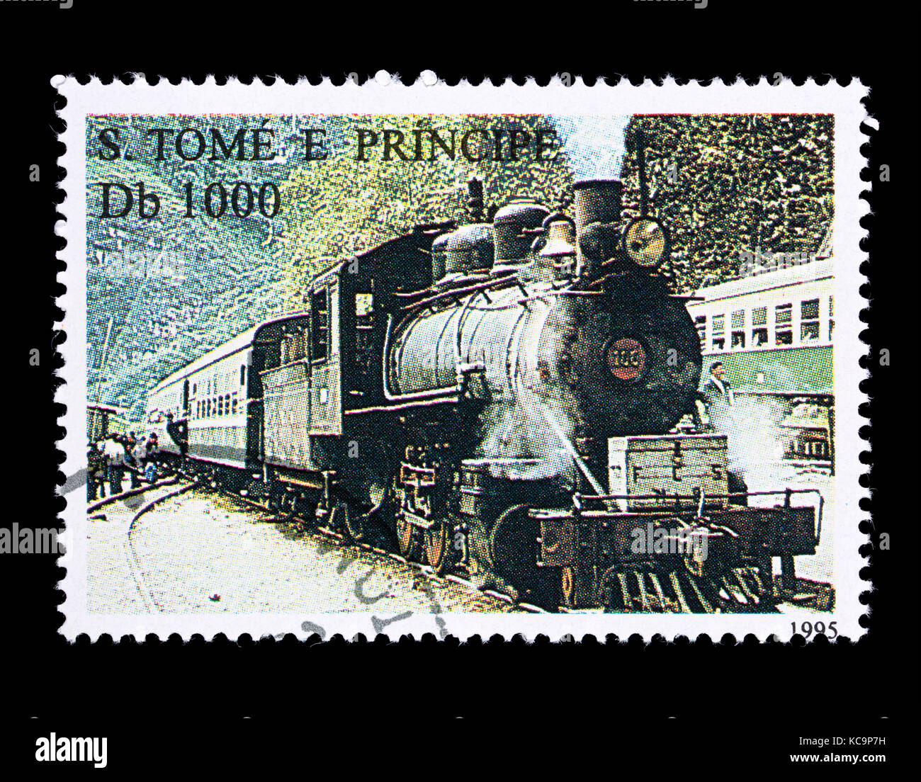 Postage stamp from Saint Thomas and Prince Islands depicting a Filipino steam locomotive and tender with passenger cars. Stock Photo