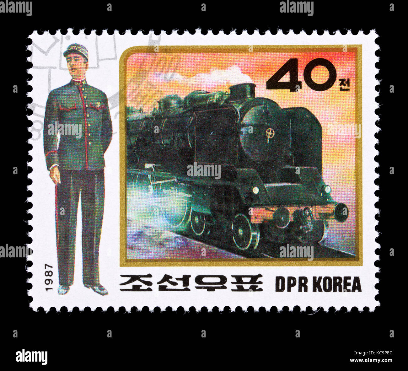 Postage stamp from North Korea depicting the Orient Express train and conductor in uniform. Stock Photo