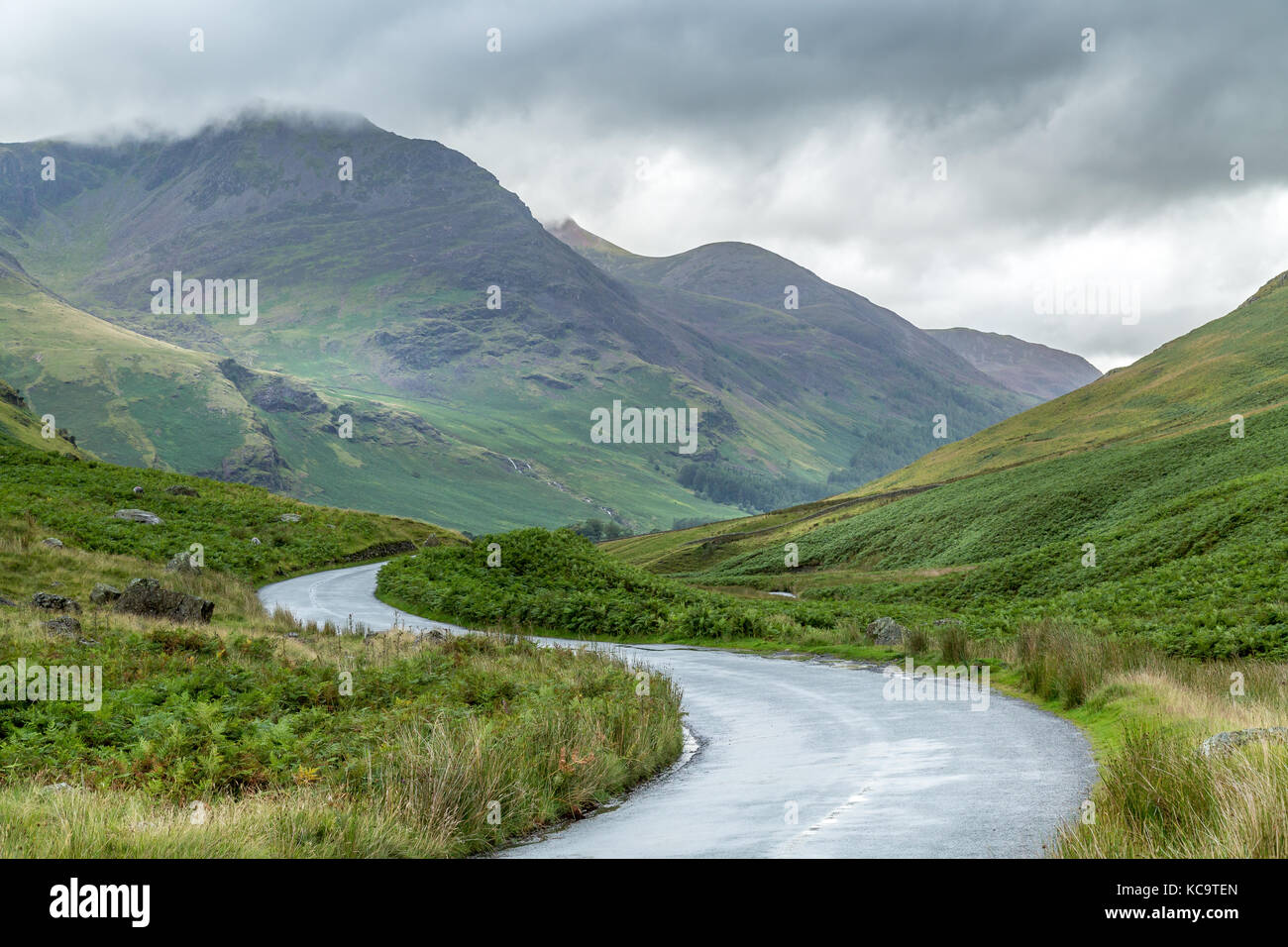 A landscape view of the road through Honister Pass in the Lake District, Cumbria, United Kingdom. Stock Photo