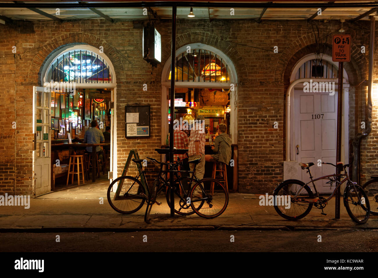 NEW ORLEANS, LOUISIANA, May 4, 2015 : Night life on Bourbon Street. Known for its bars and strip clubs, Bourbon Street's history provides a rich insig Stock Photo