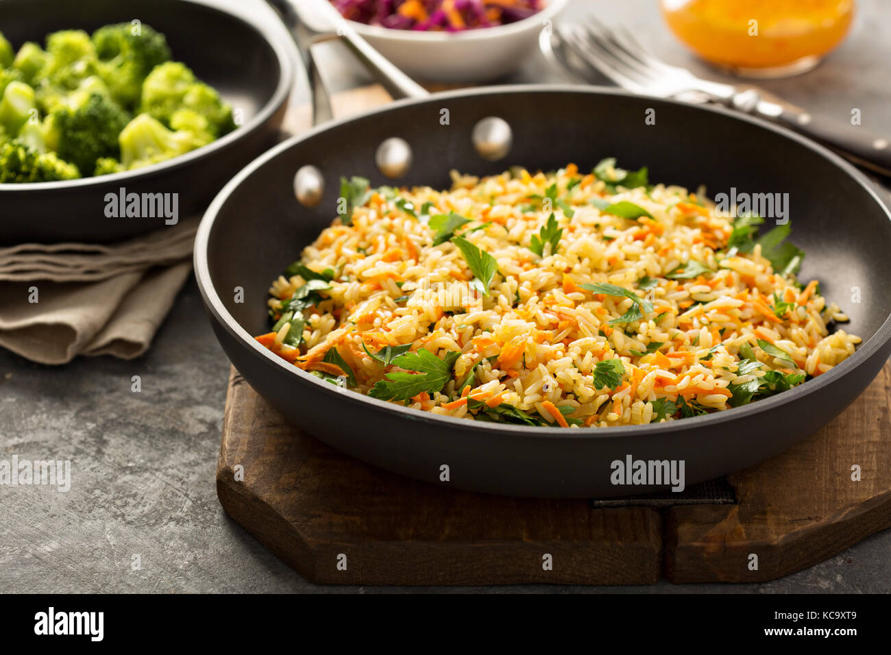 Fried rice with vegetables and steamed broccoli Stock Photo Alamy