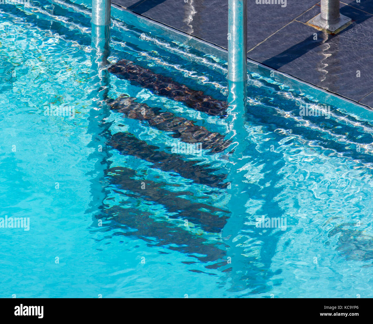 An outdoor swimming pool ladder Stock Photo Alamy