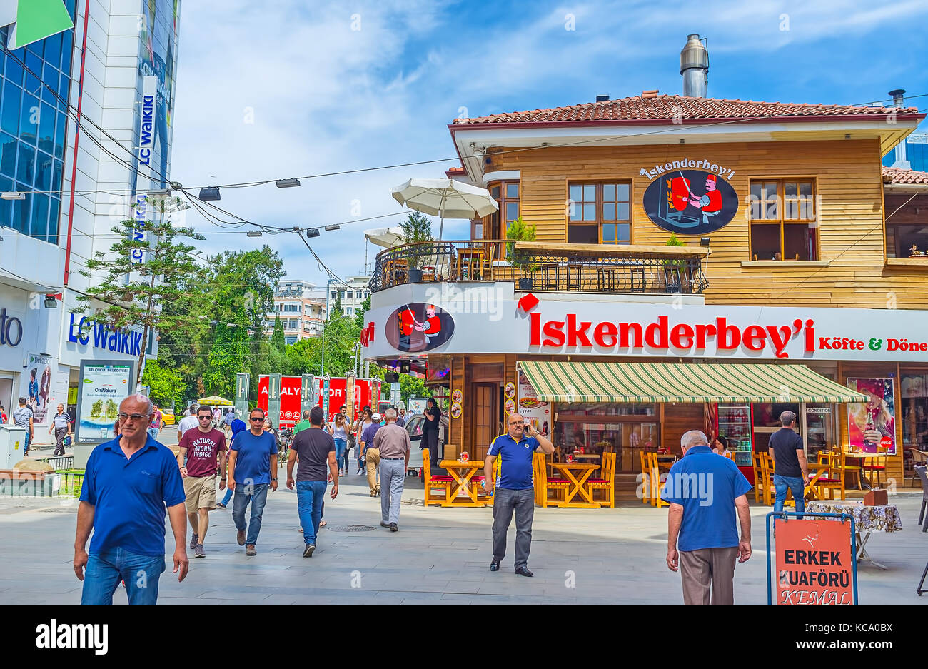 ANTALYA, TURKEY - MAY 12, 2017: The modern shopping neighborhood boasts different cafes and restaurants, offering traditional Turkish and Eastern cuis Stock Photo
