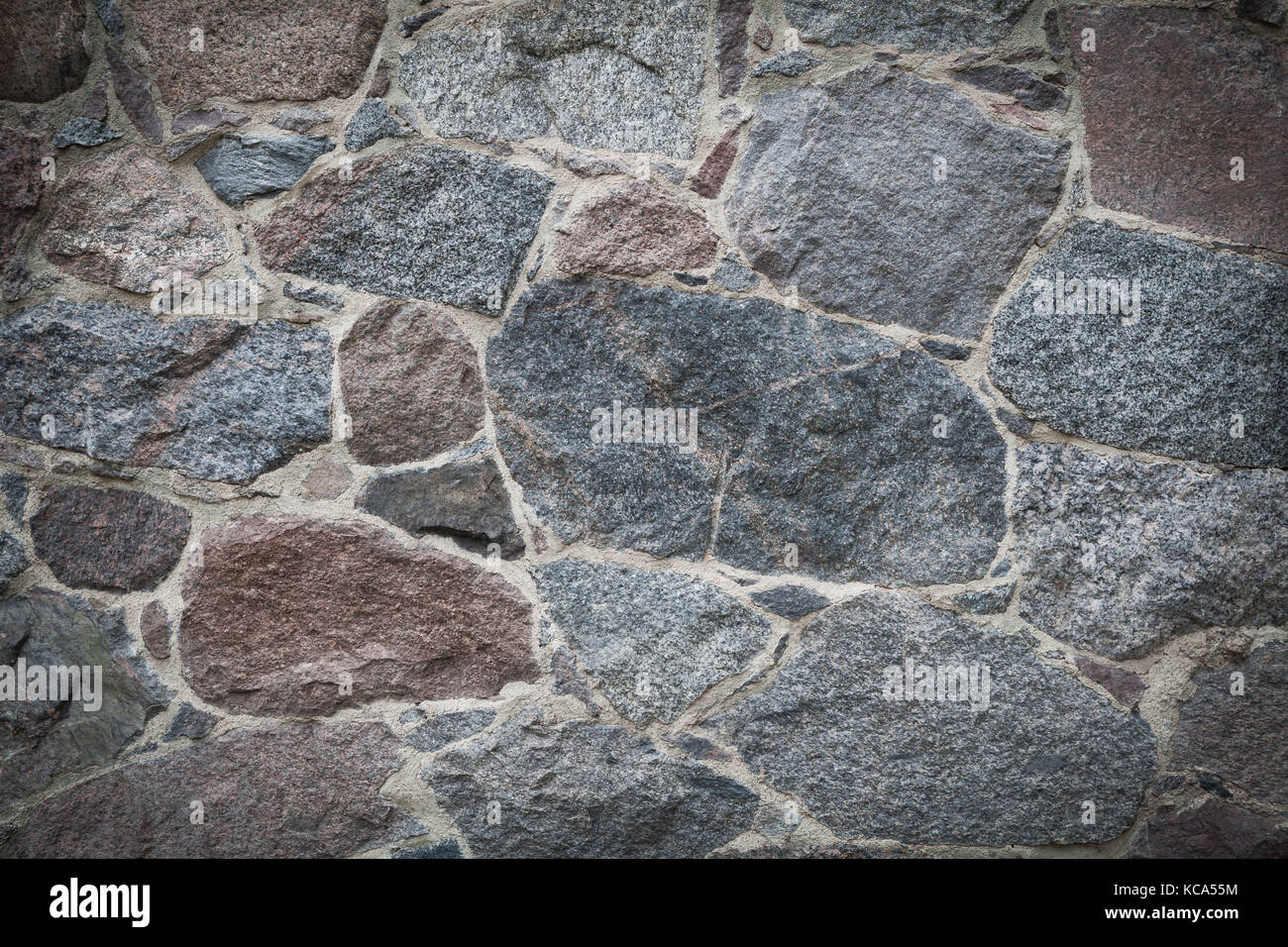 Classic vignette stone wall background Stock Photo