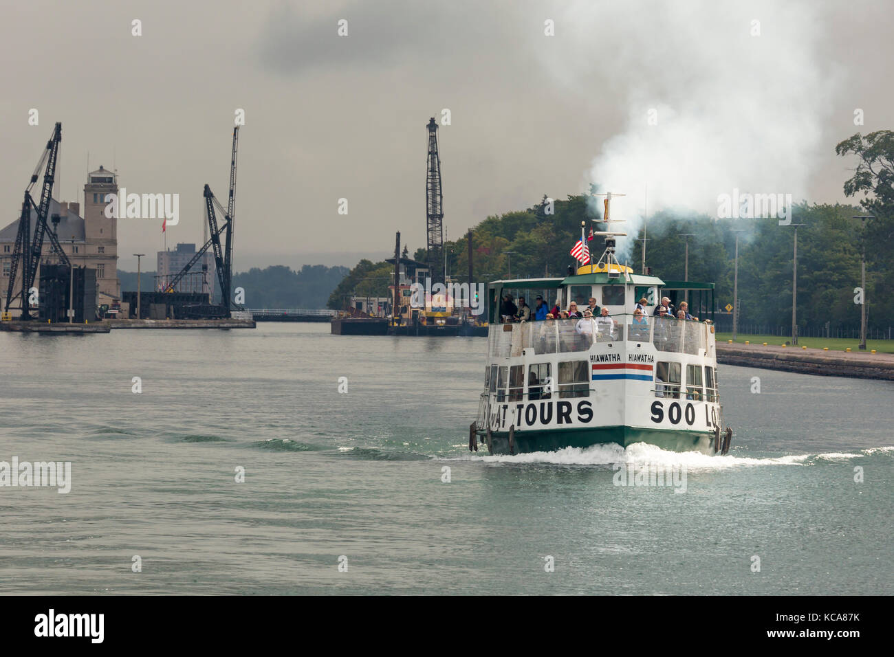 Sault Ste Marie, Michigan - The Soo Locks tour boat leaves the MacArthur Lock. Operated by the U.S. Army Corps of Engineers, the locks enable shipping Stock Photo