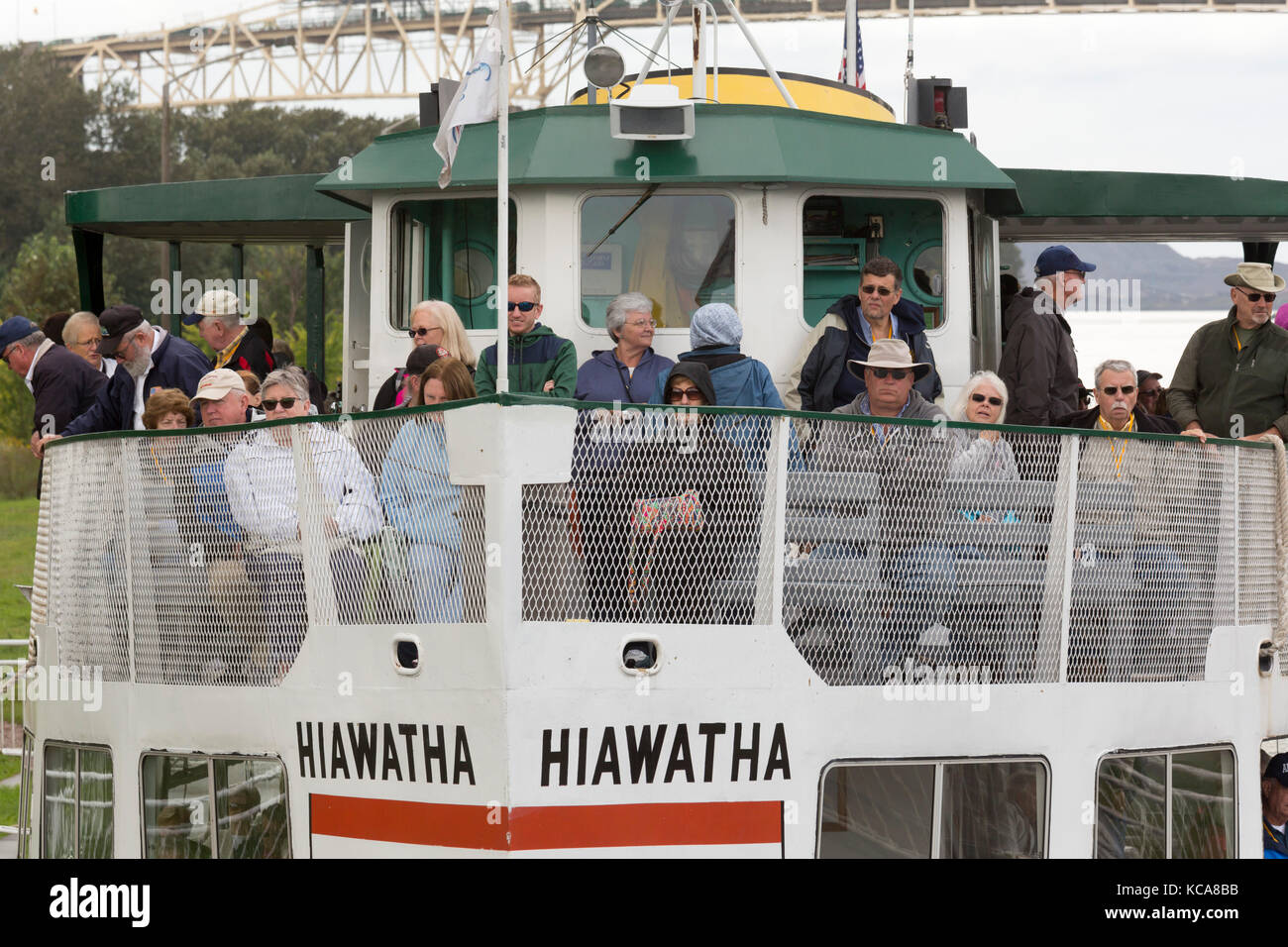 Sault Ste Marie, Ontario Canada - Tourists on a boat tour of the Soo Locks as the boat passes through the Canadian lock. The small Canadian lock is us Stock Photo