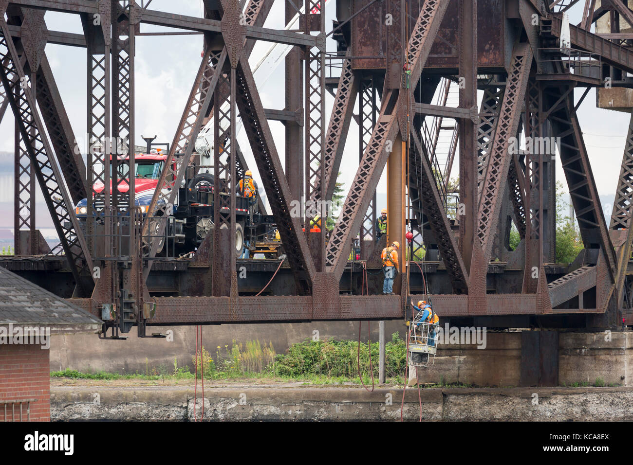 Sault Ste Marie, Michigan - Workers repair the international railroad bridge which connects Canada and Michigan above the St. Mary's River and the Soo Stock Photo