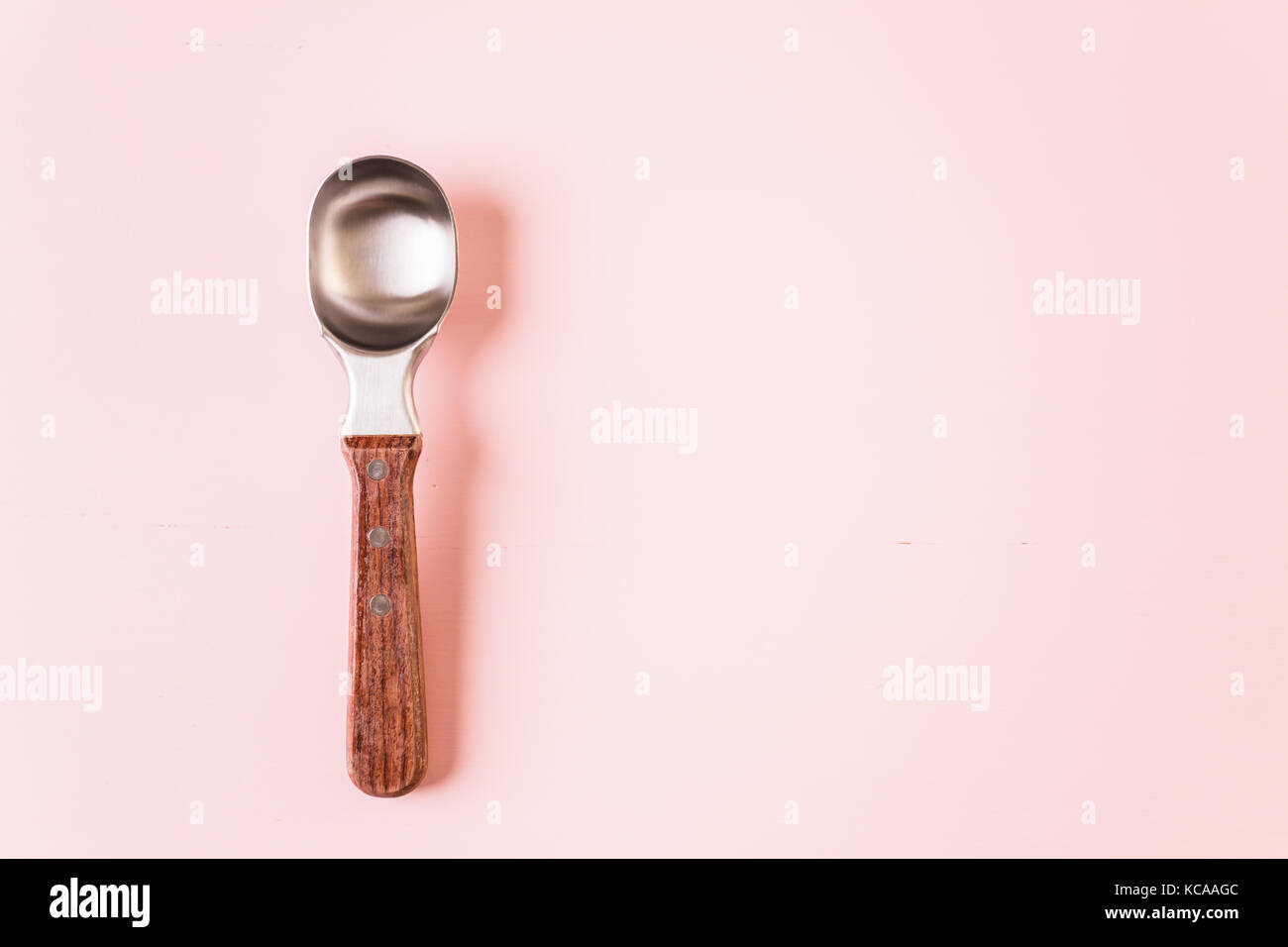 ice cream scoop on a pink background Stock Photo - Alamy