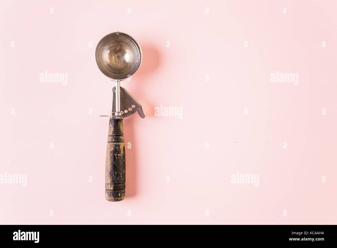 ice cream scoop on a pink background Stock Photo - Alamy