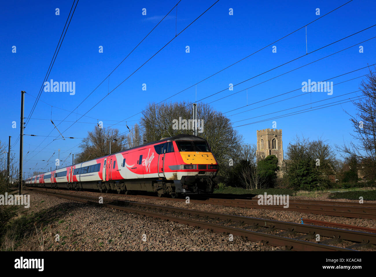 82212 Virgin Trains, Offord Cluny village, East Coast Main Line Railway, Cambridgeshire, England, UK Stock Photo
