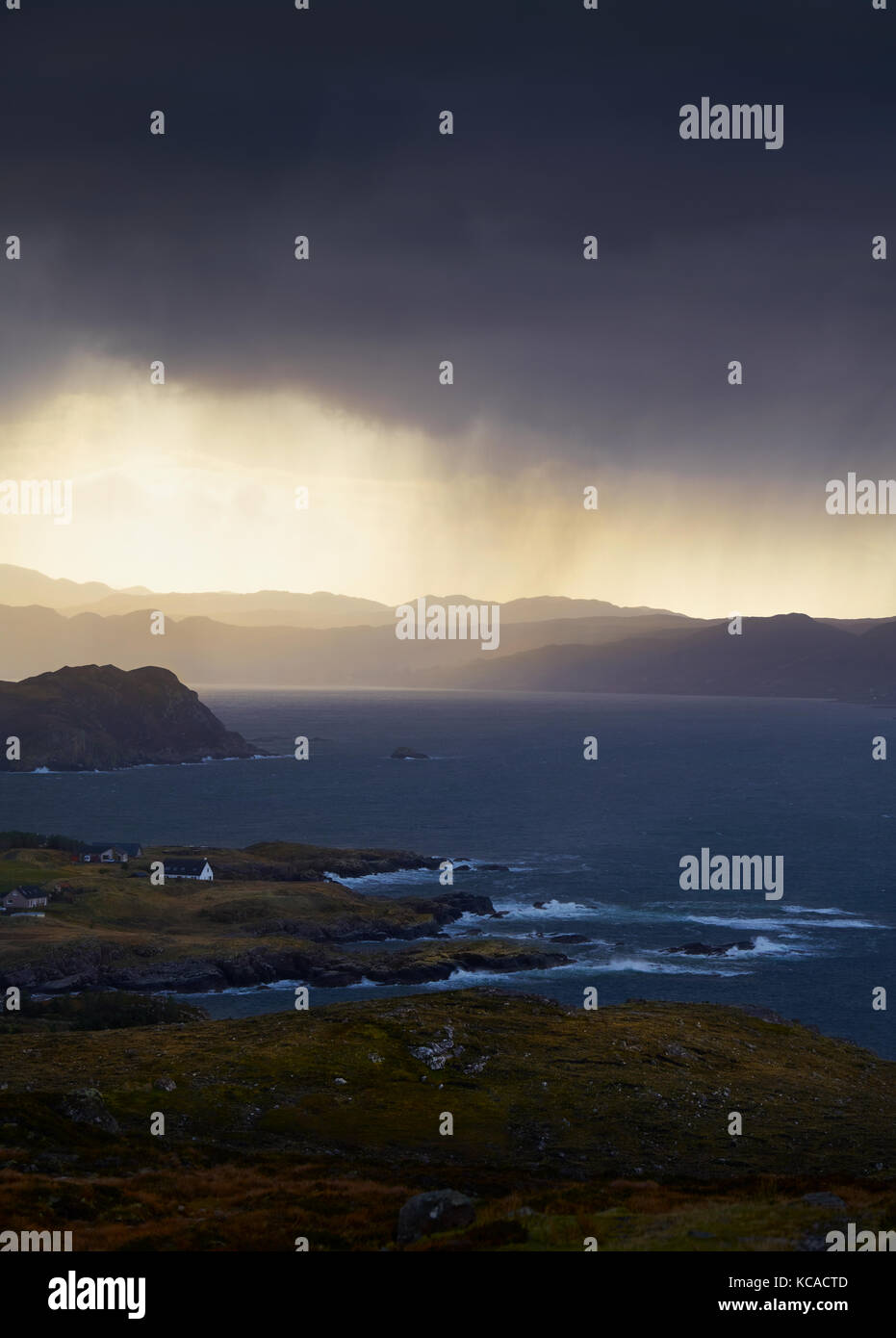 Heavy rain over coastal crofts at Loch Ewe, Scottish Highlands