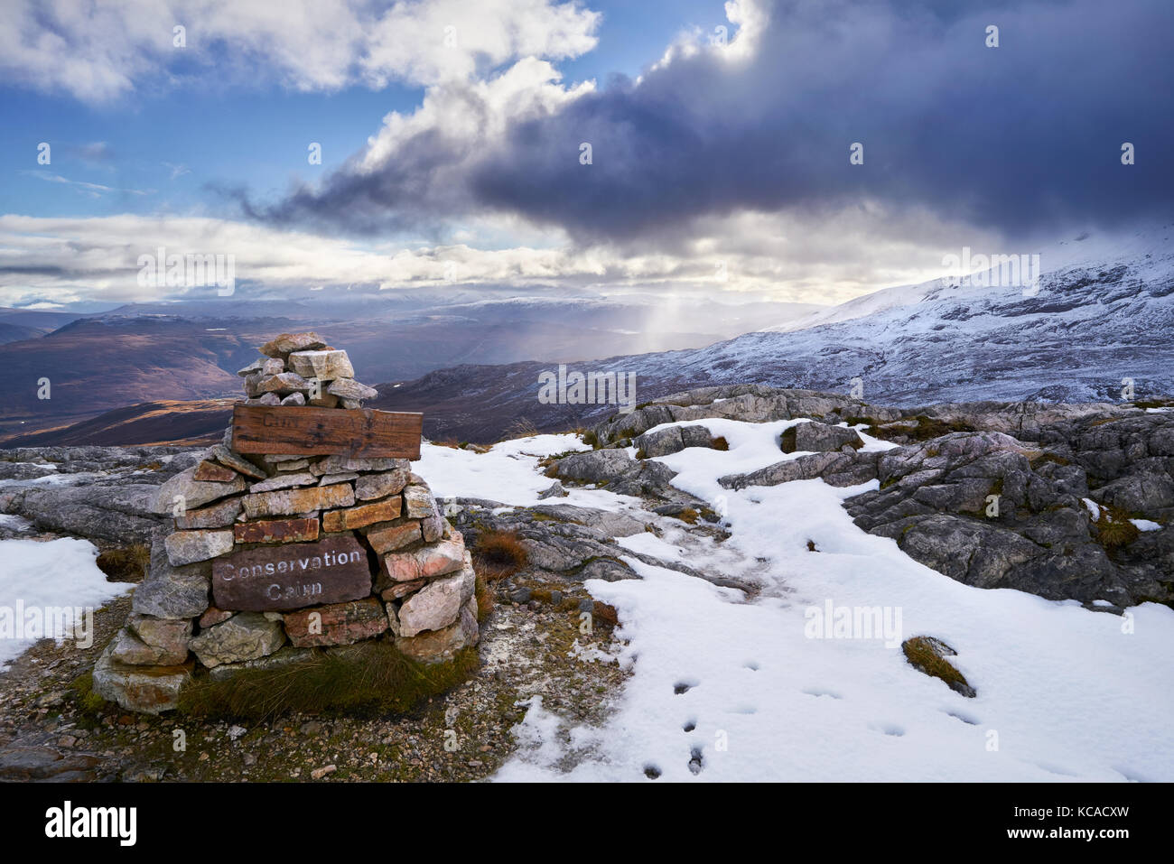 A conservation Cairn on Beinn Eighe with the summit of Creag Dhubh in the distance. Scottish Highlands, Scotland, UK. Stock Photo