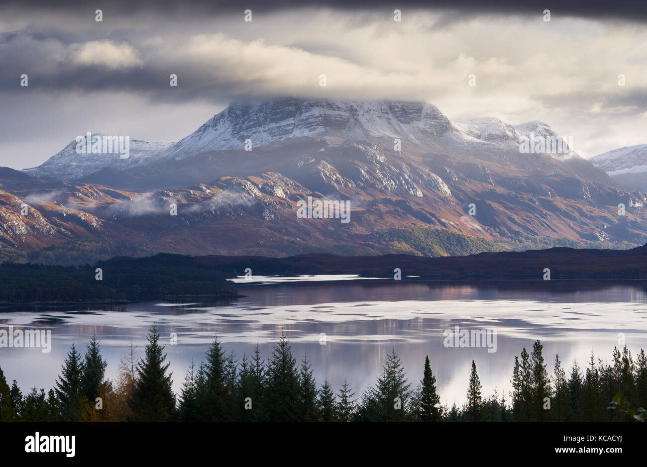 The summits of Slioch and Beinn a Mhuinidh over Loch Maree in the Scottish Highlands, Scotland, UK. Stock Photo