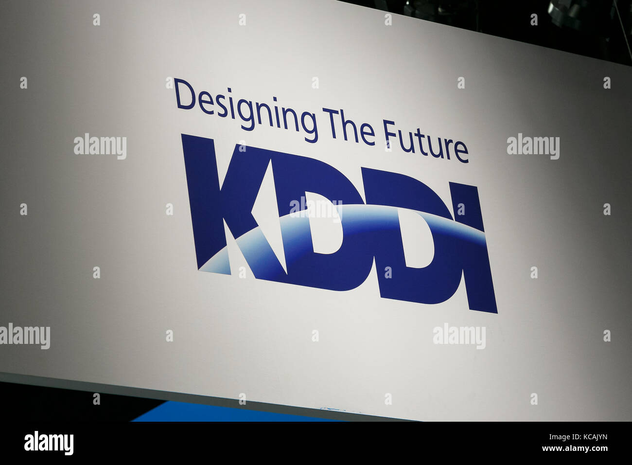 A logo of KDDI company on display at CEATEC Japan 2017 on October 3