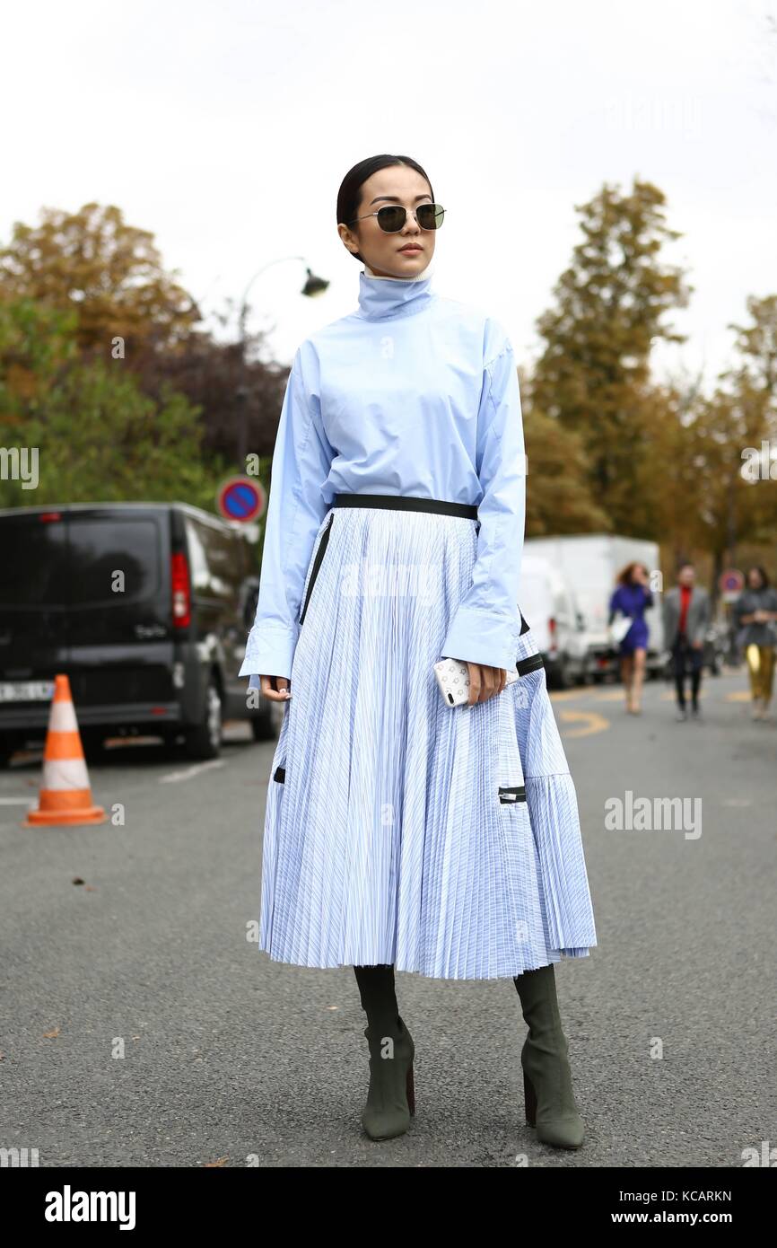 Yoyo Cao wears a white wool turtleneck / studded pullover from Louis  News Photo - Getty Images