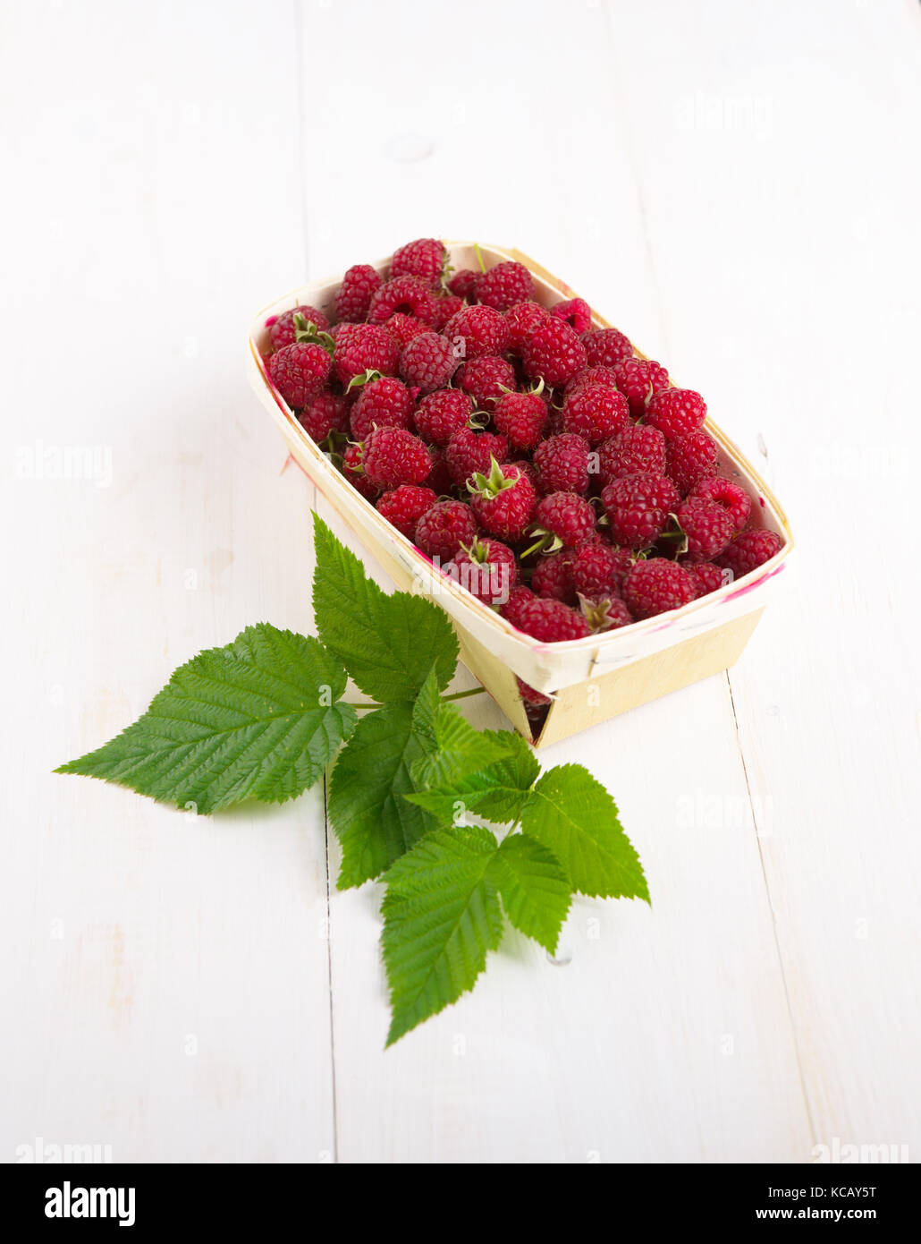 raspberries in box Stock Photo - Alamy