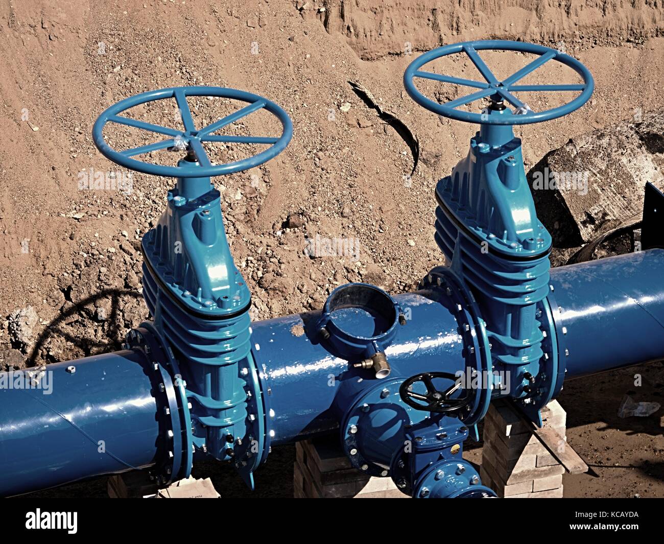 Gate valves underground, water pipeline valve on a blue pipeline after