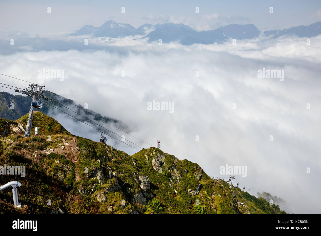 Beautiful clouds and fog among mountain landscape Stock Photo - Alamy