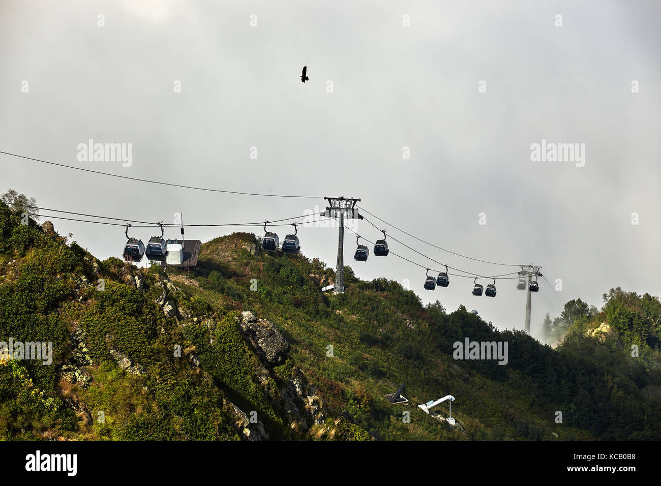 Rope Way View View from top of ropeway with multiple seats and stretched cables above ...