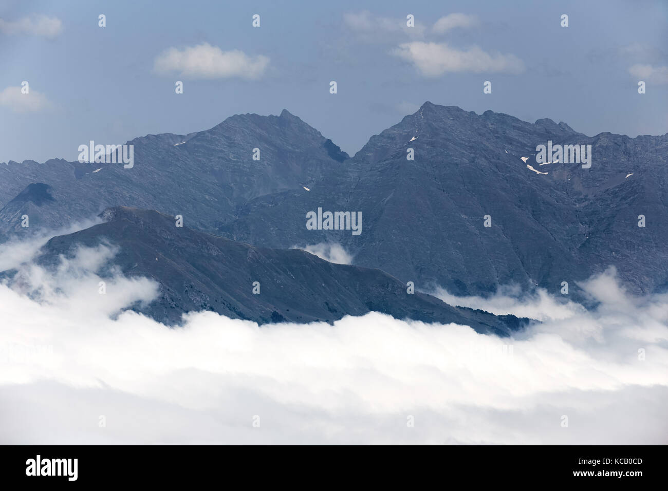 Beautiful clouds and fog among mountain landscape Stock Photo - Alamy