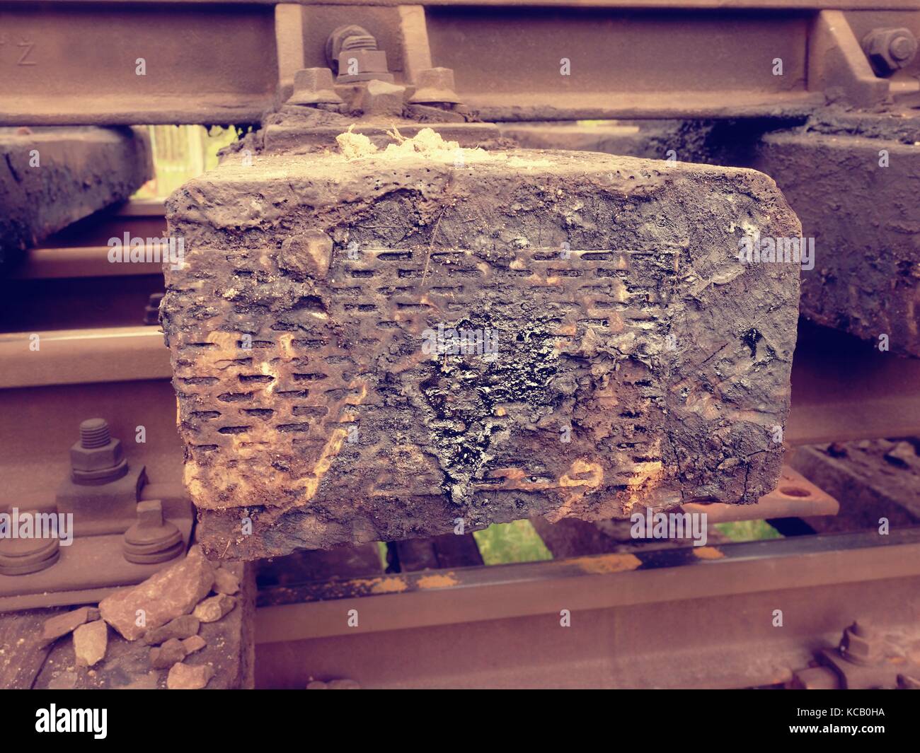 Terrible smell extracted old wooden ties with phenol asphalt paint. Old oiled used oak railway