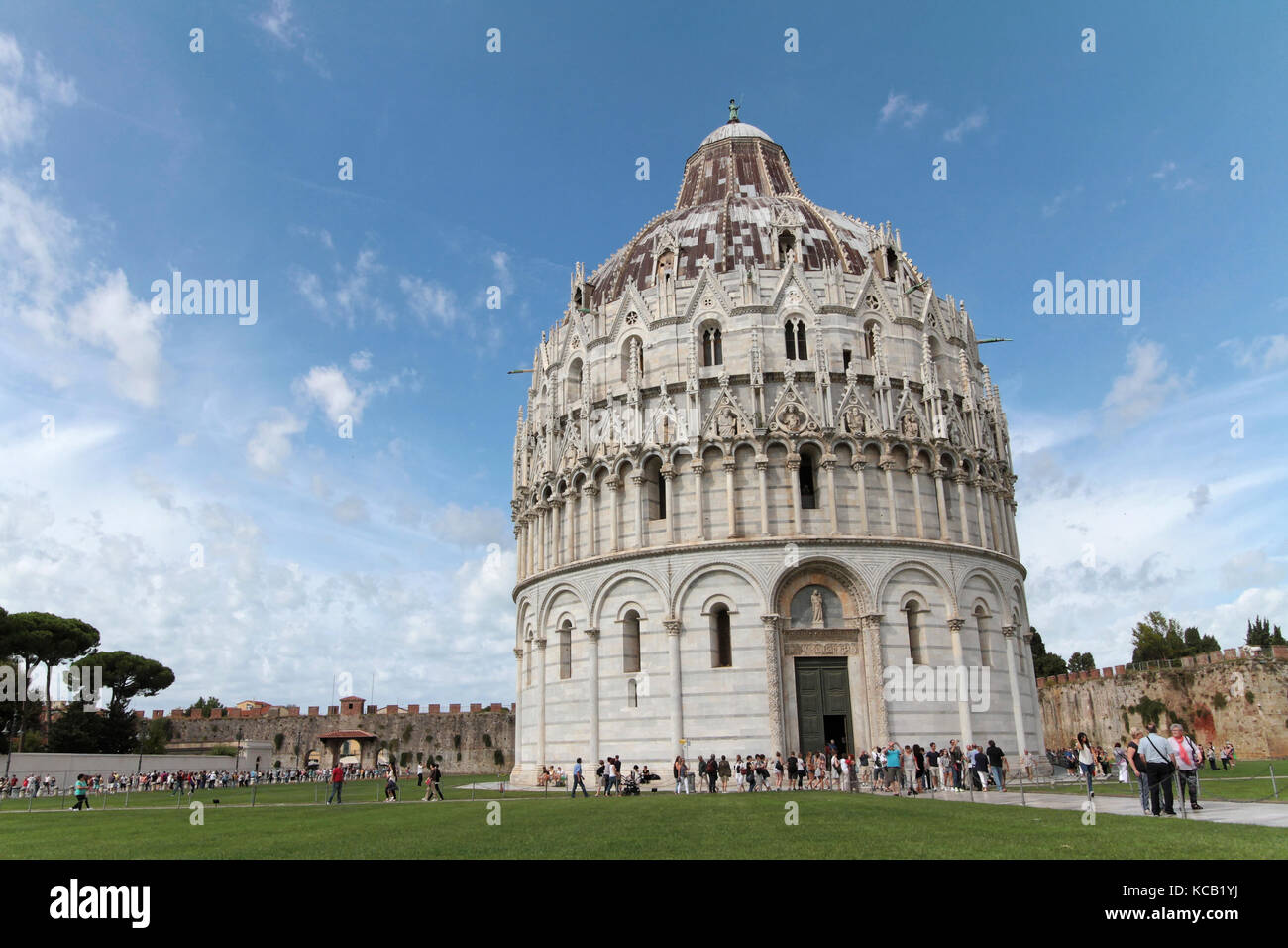PISA, ITALY, September 15, 2015 : Pisa Baptistry of St. John on Piazza dei Miracoli. Piazza del Duomo is a wide walled area located in Pisa, Stock Photo