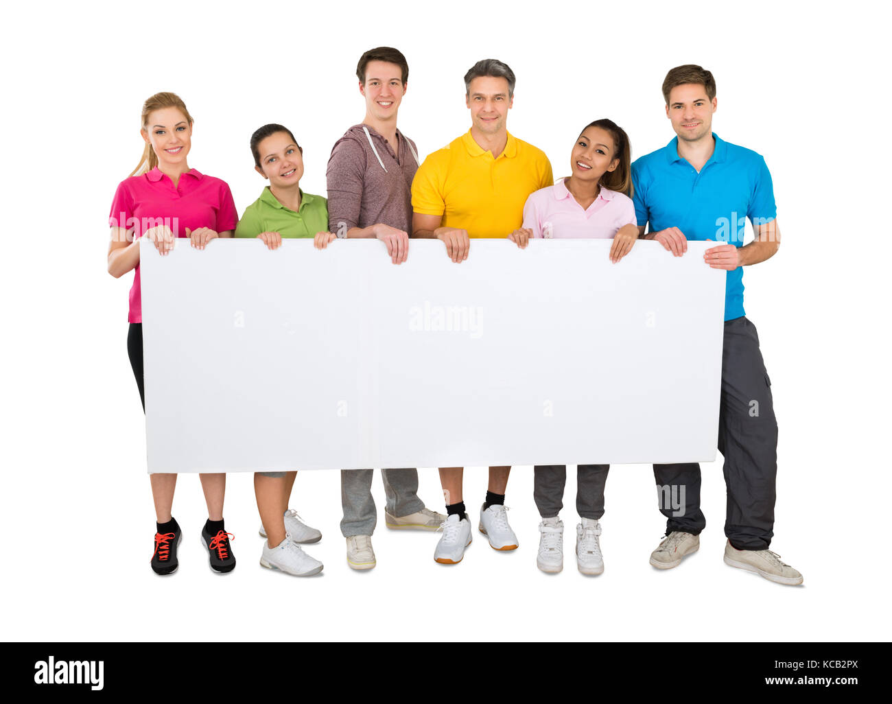 Group Of Smiling People Holding Blank Banner In Front Of A White Background  Stock Photo - Alamy