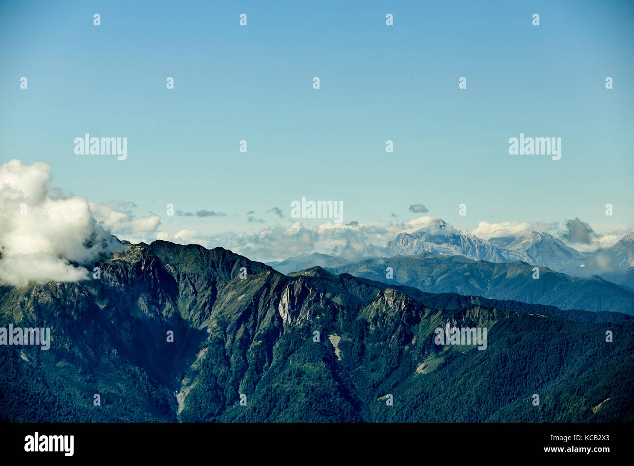 Beautiful clouds and fog among mountain landscape Stock Photo - Alamy