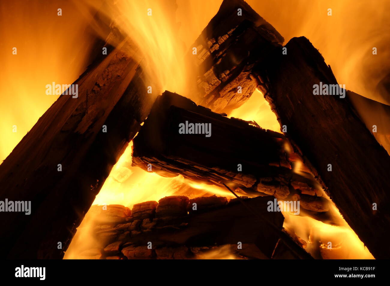 Burning fireplace with intense fire. Taken with long exposure Stock
