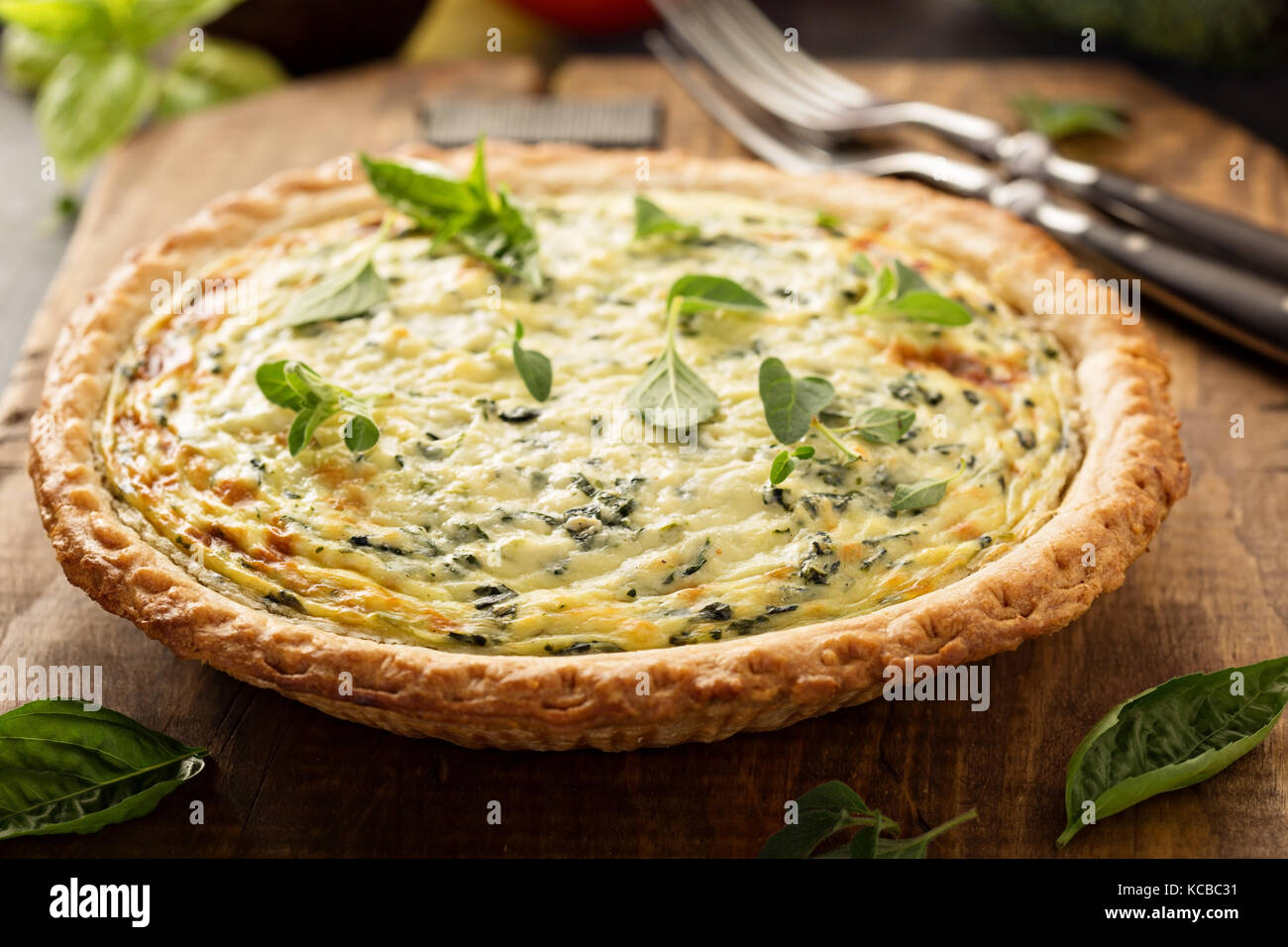 Spinach and herb Florentine quiche Stock Photo Alamy