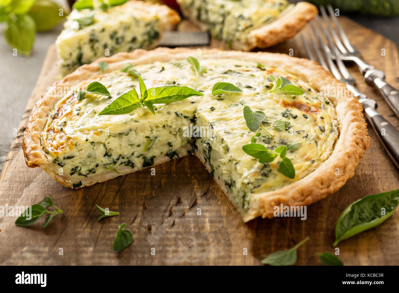 Spinach and herb Florentine quiche Stock Photo - Alamy