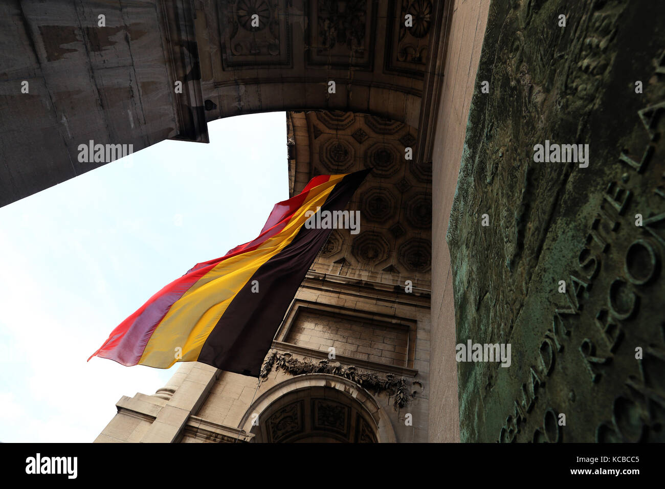 Belgian  flag in famous  triumphal arch in Parc du Cinquantenaire close-up. Stock Photo