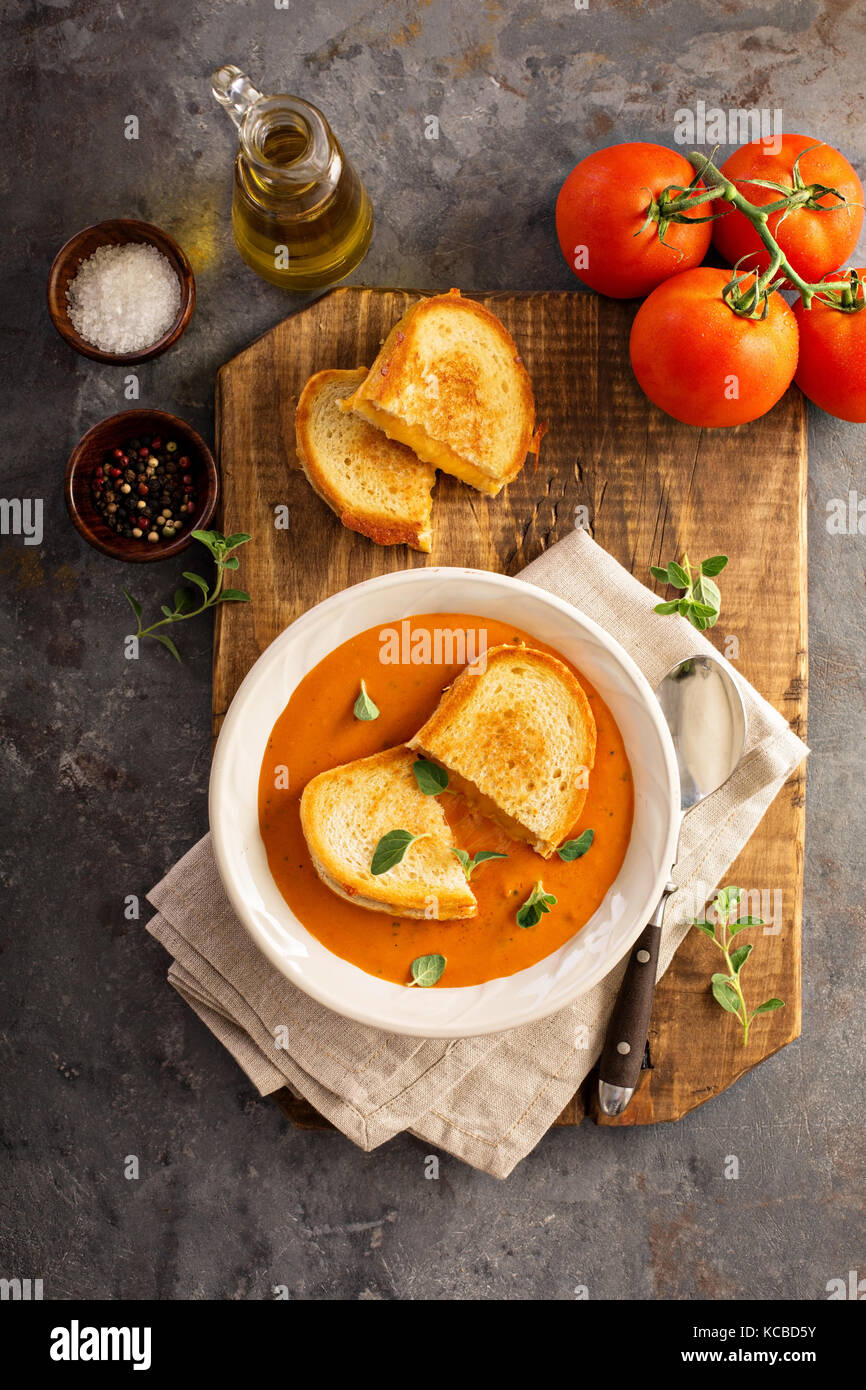 Tomato soup with grilled cheese sandwiches Stock Photo Alamy