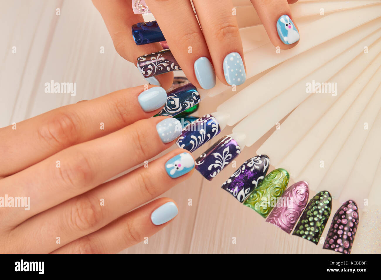 Beautiful manicure and nail art samples. Stock Photo