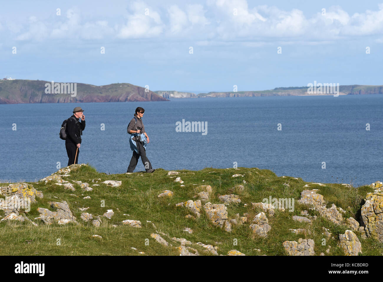 People walking Pembrokeshire Coast Path between Stackpole Quay and ...