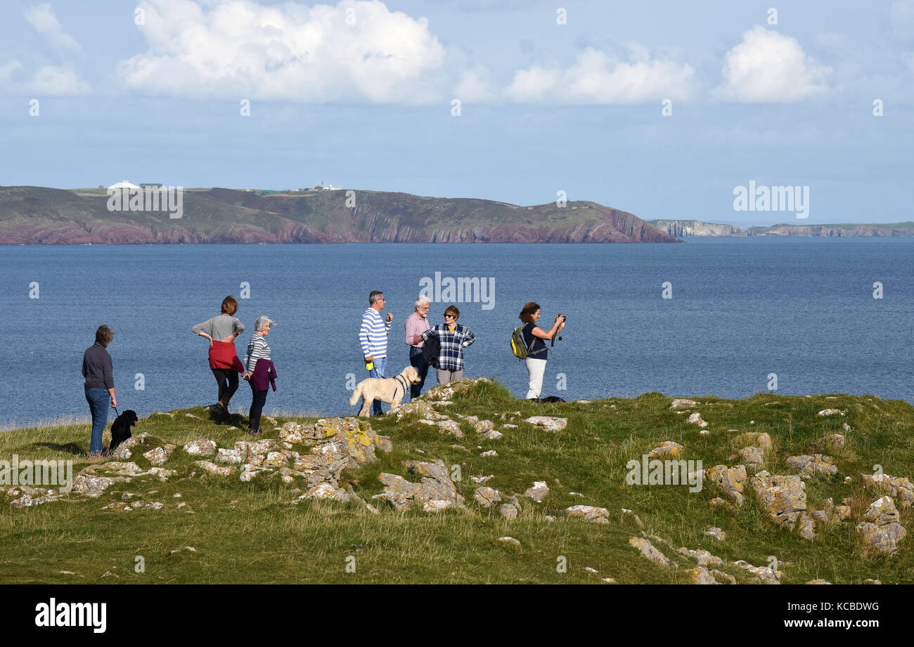 People walking Pembrokeshire Coast Path between Stackpole Quay and ...