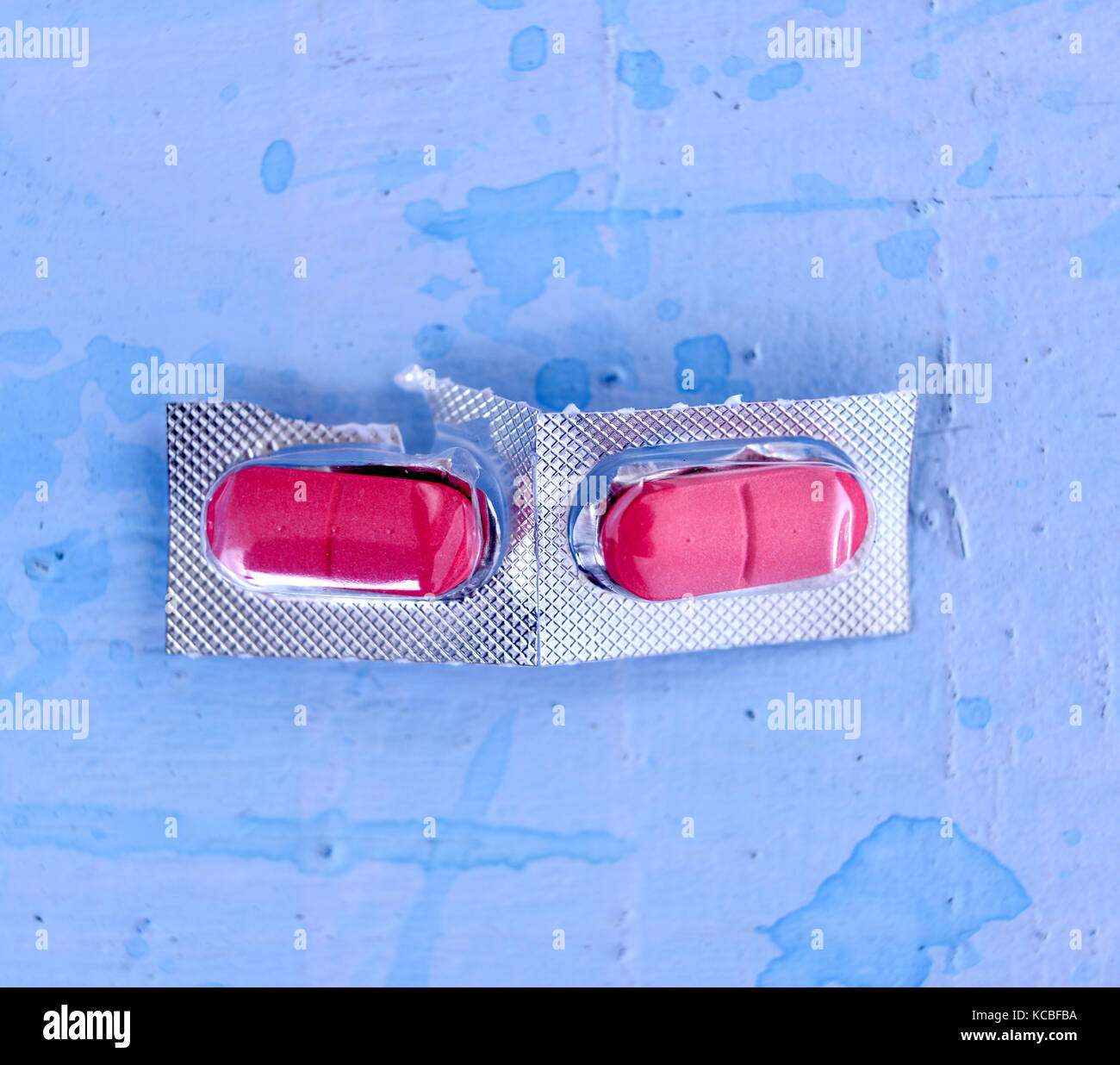 red pills in a blister packaging, image of a Stock Photo Alamy
