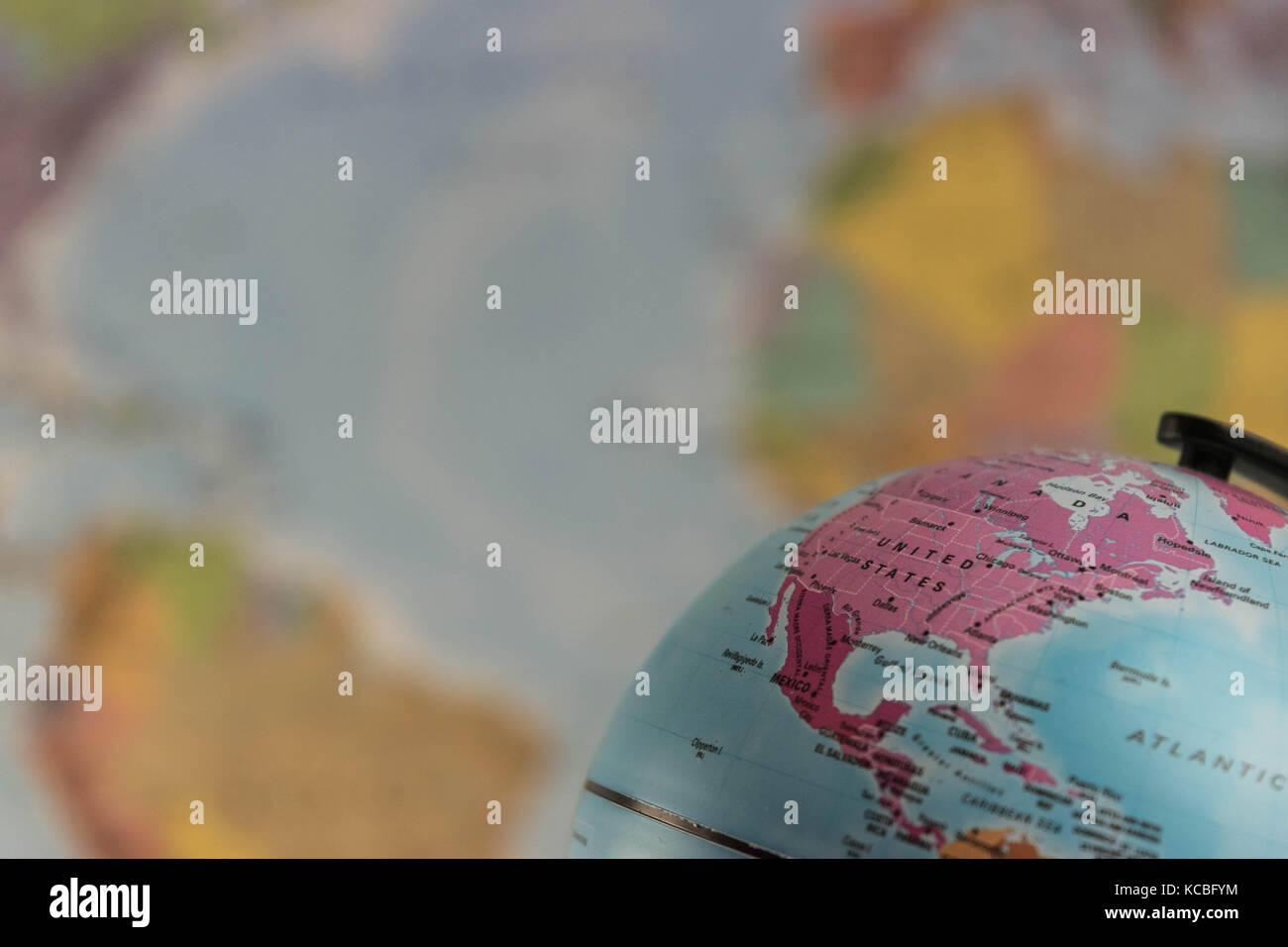 The United States of America on the map globe with blurred map as background Stock Photo