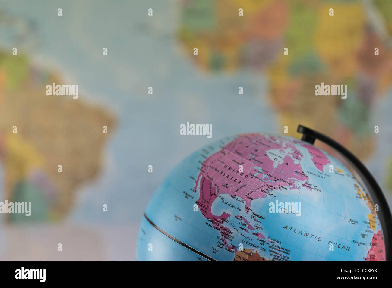 The United States of America on the map globe with blurred map as background Stock Photo