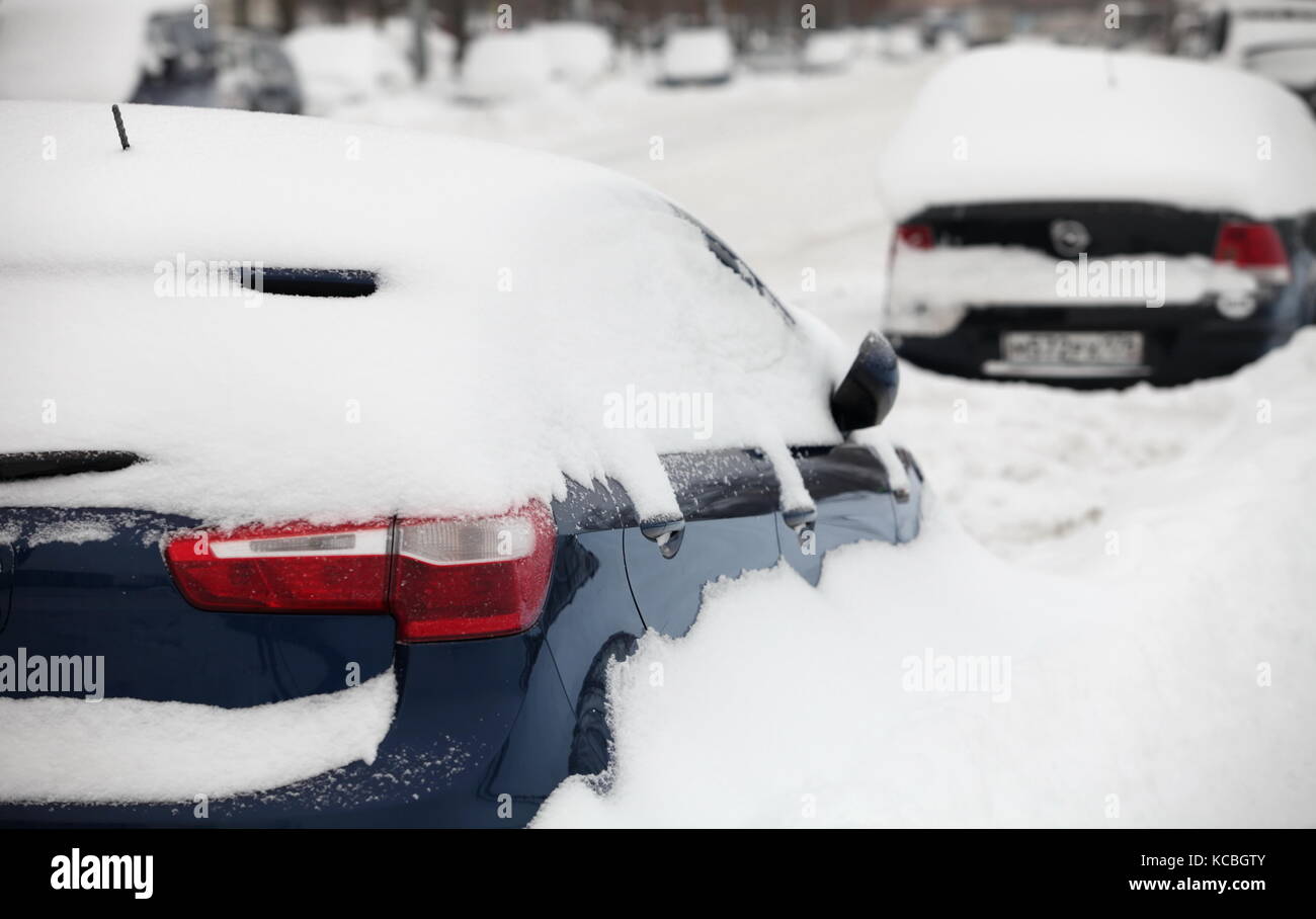 cars covered with snow in the parking Stock Photo Alamy