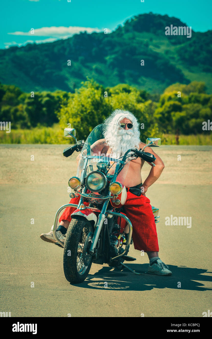 Santa on a motorcycle Stock Photo Alamy