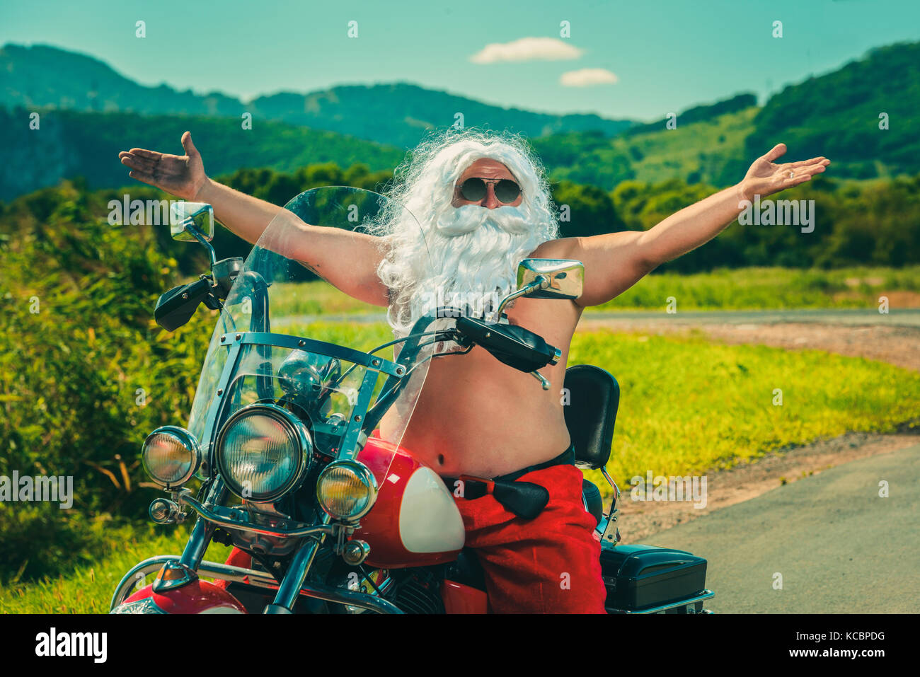 Santa on a motorcycle Stock Photo Alamy