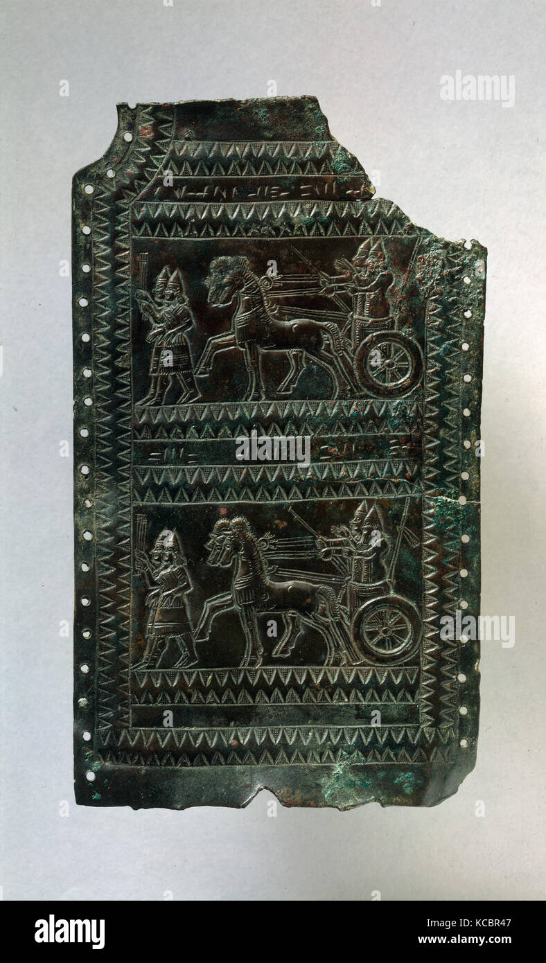 Plaque fragment with chariot scenes inscribed with the Urartian royal name Argishti, ca. 713–679 B.C Stock Photo