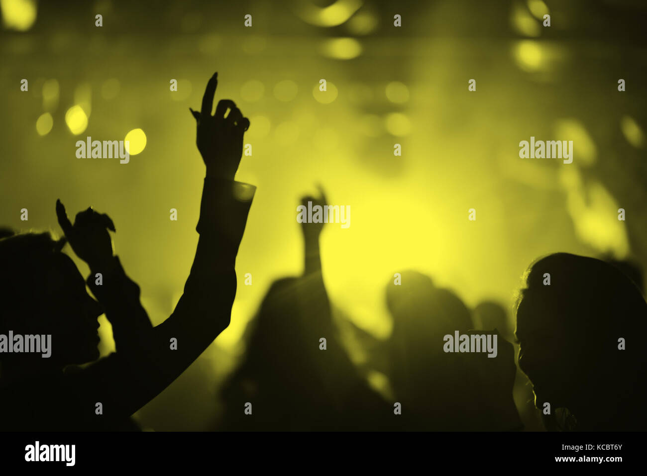 Hands of people in a nightclub Stock Photo - Alamy
