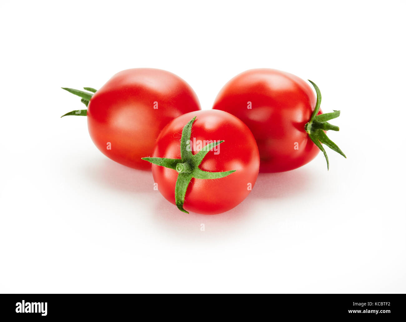 Three fresh ripe red tomatoes isolated on a white background Stock ...