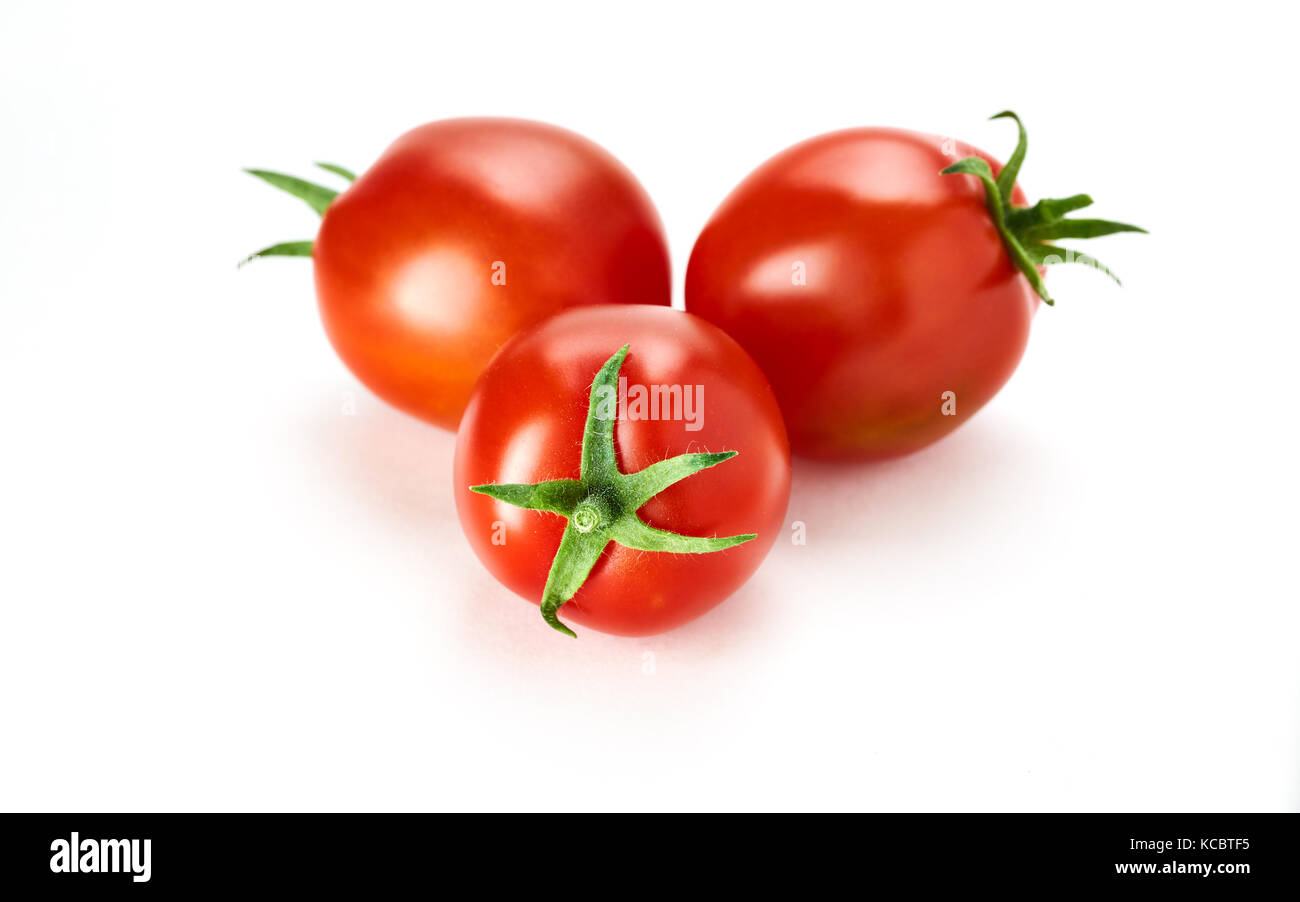 Three fresh ripe red tomatoes isolated on a white background Stock ...