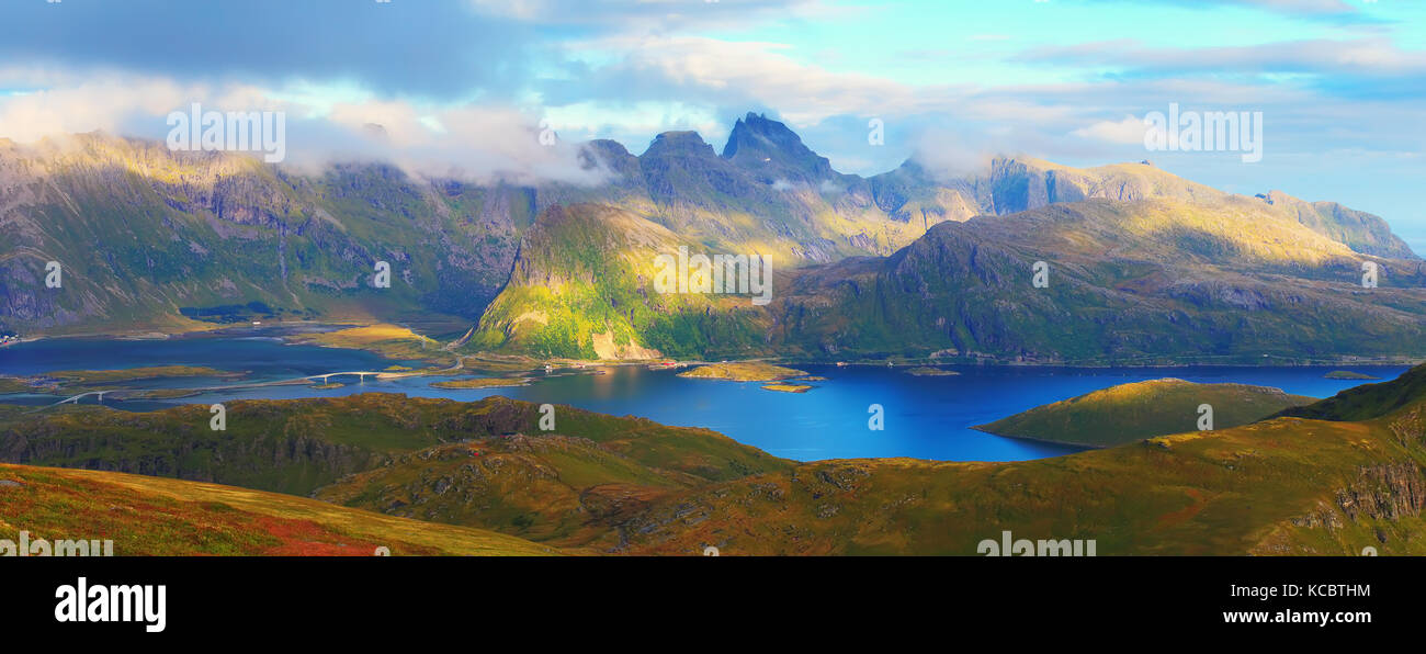 Panoramic view of Lofoten islands in Norway. Sunny nature of Norway. Summer landscape of Norwegian mountains. Stock Photo