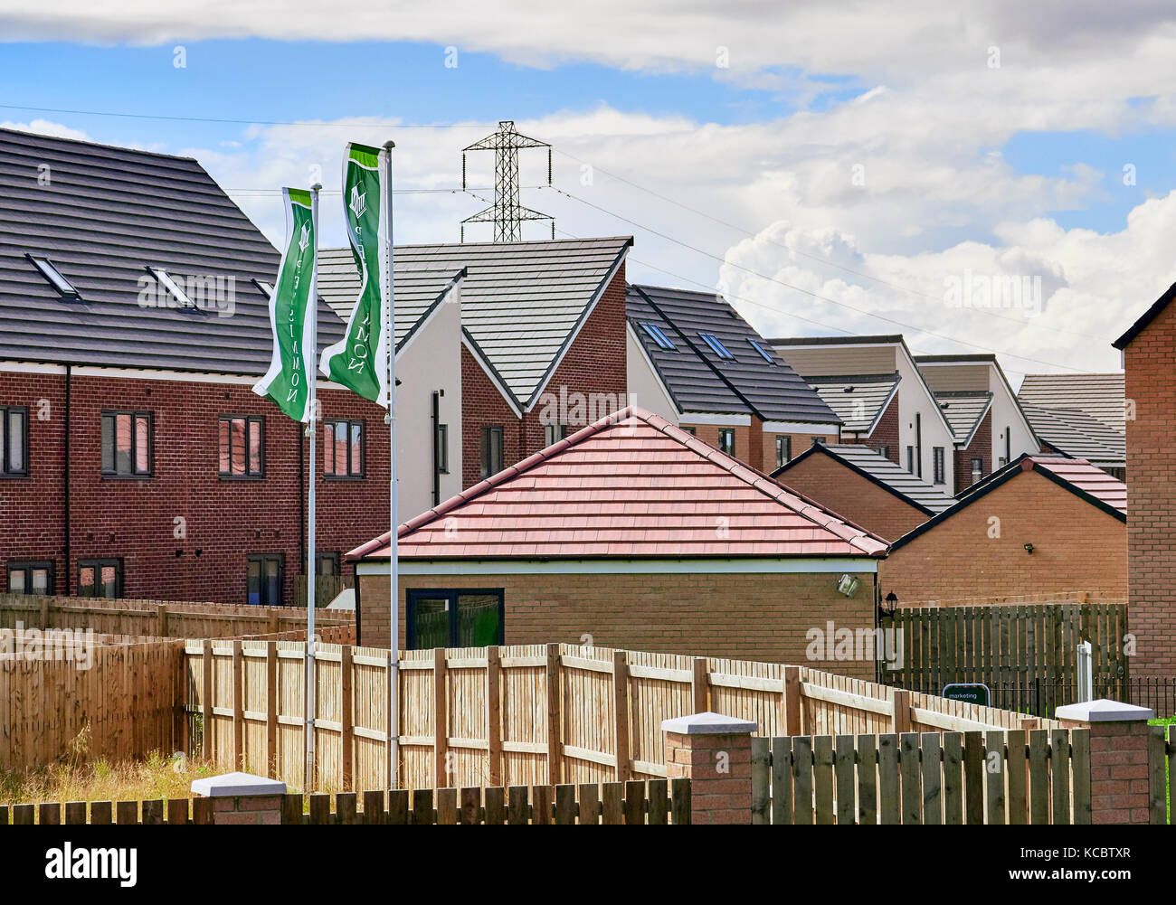 NEWCASTLE UPON TYNE, ENGLAND, UK - AUGUST 15, 2017: Newly built homes by Persimmon  in a residential estate in England. Stock Photo