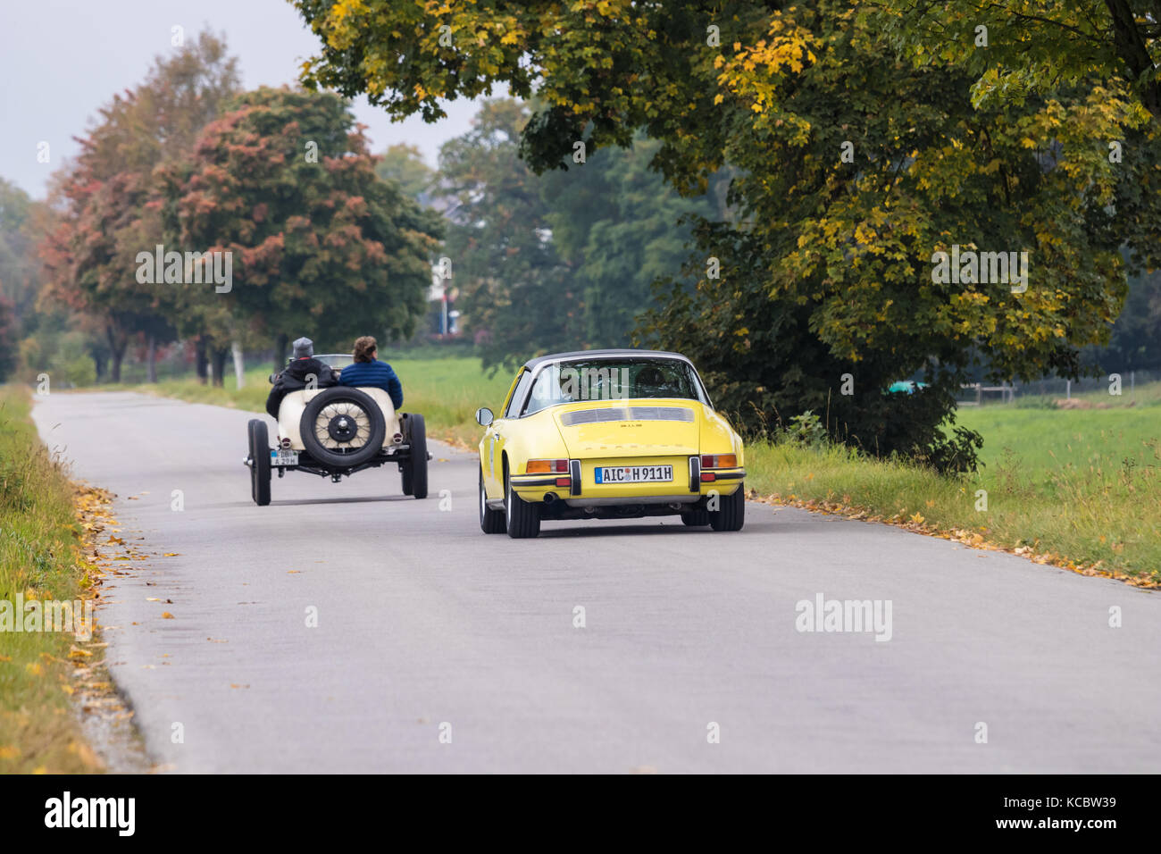 Augsburg, Germany - October 1, 2017: 1969 Porsche 911 S Targa and Ford oldtimer cars at the Fuggerstadt Classic 2017 Oldtimer Rallye on October 1, 201 Stock Photo